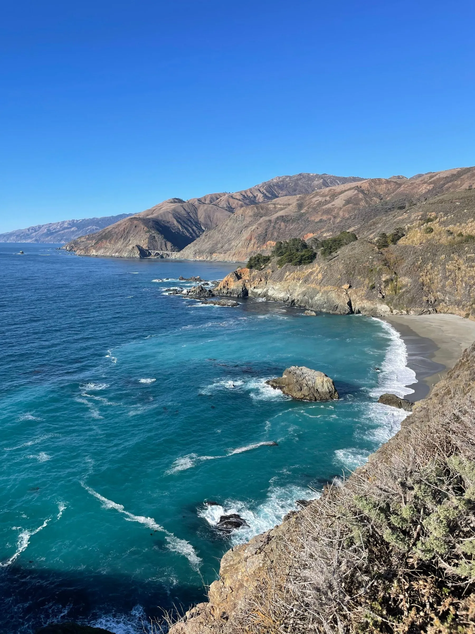 The rugged Big Sur coastline and blue Pacific Ocean